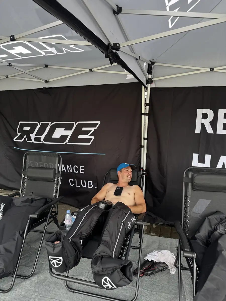 Athlete using R!CE compression boots inside the recovery zone
